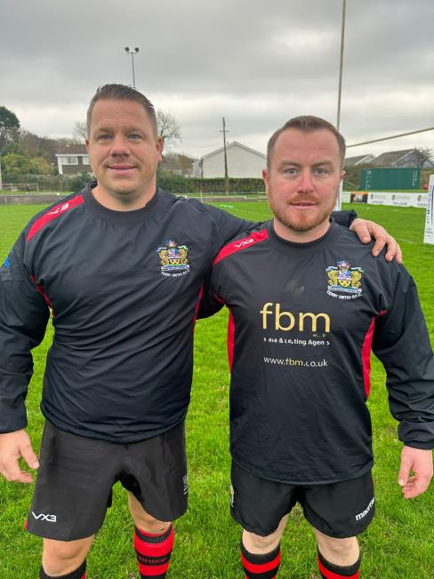 Nicky Guymer (200) and Dan Allen (100) celebrated their loyalty to Tenby United